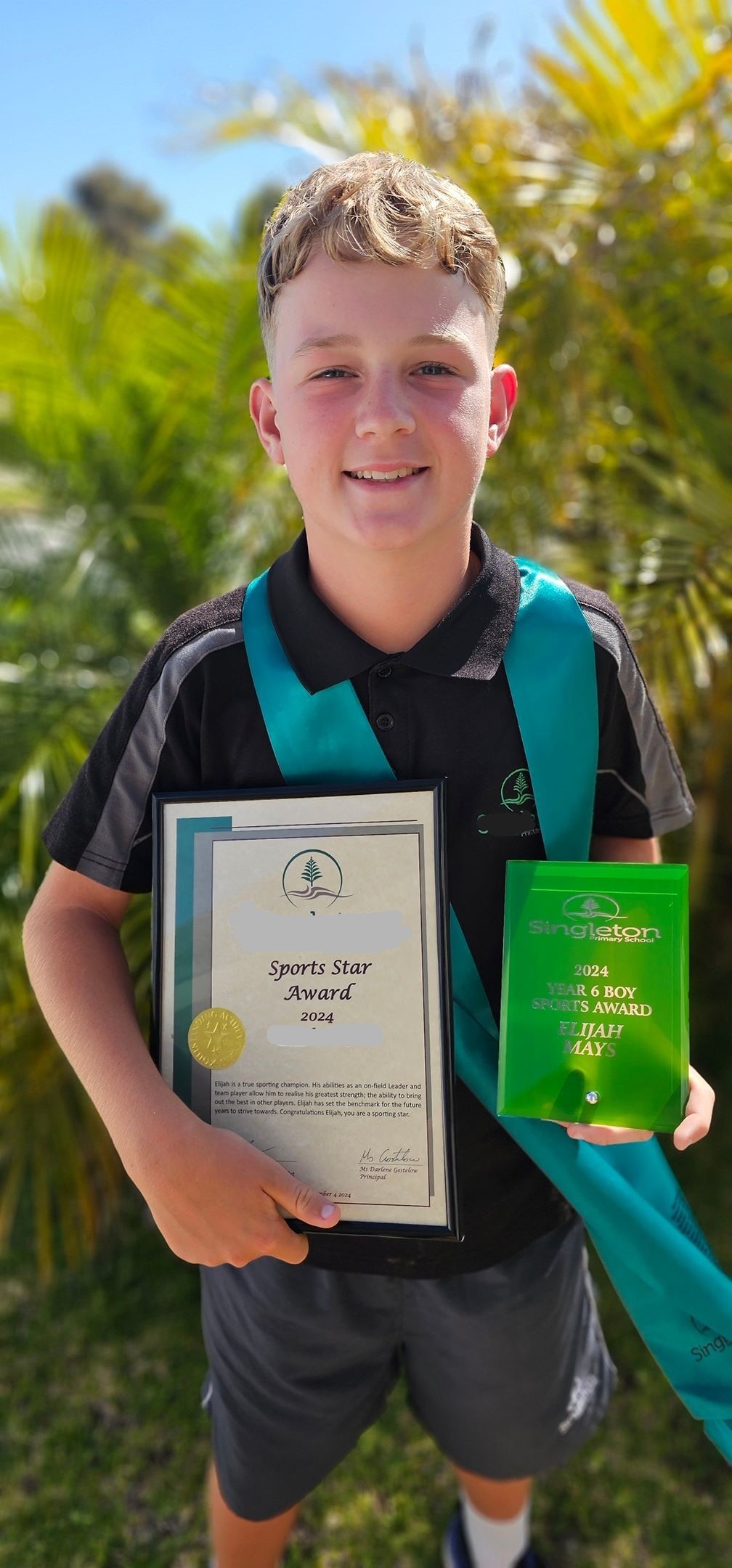 Elijah with his sport award